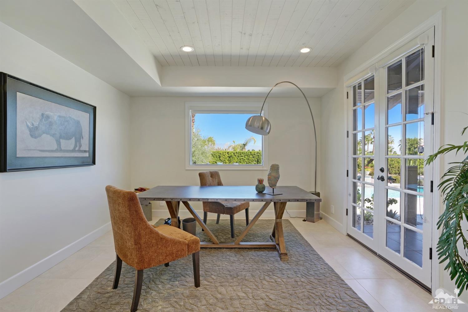 40757 Thunderbird Road Rancho Mirage, CA 92270 - Photo 39 of 70 a dining room with furniture and window