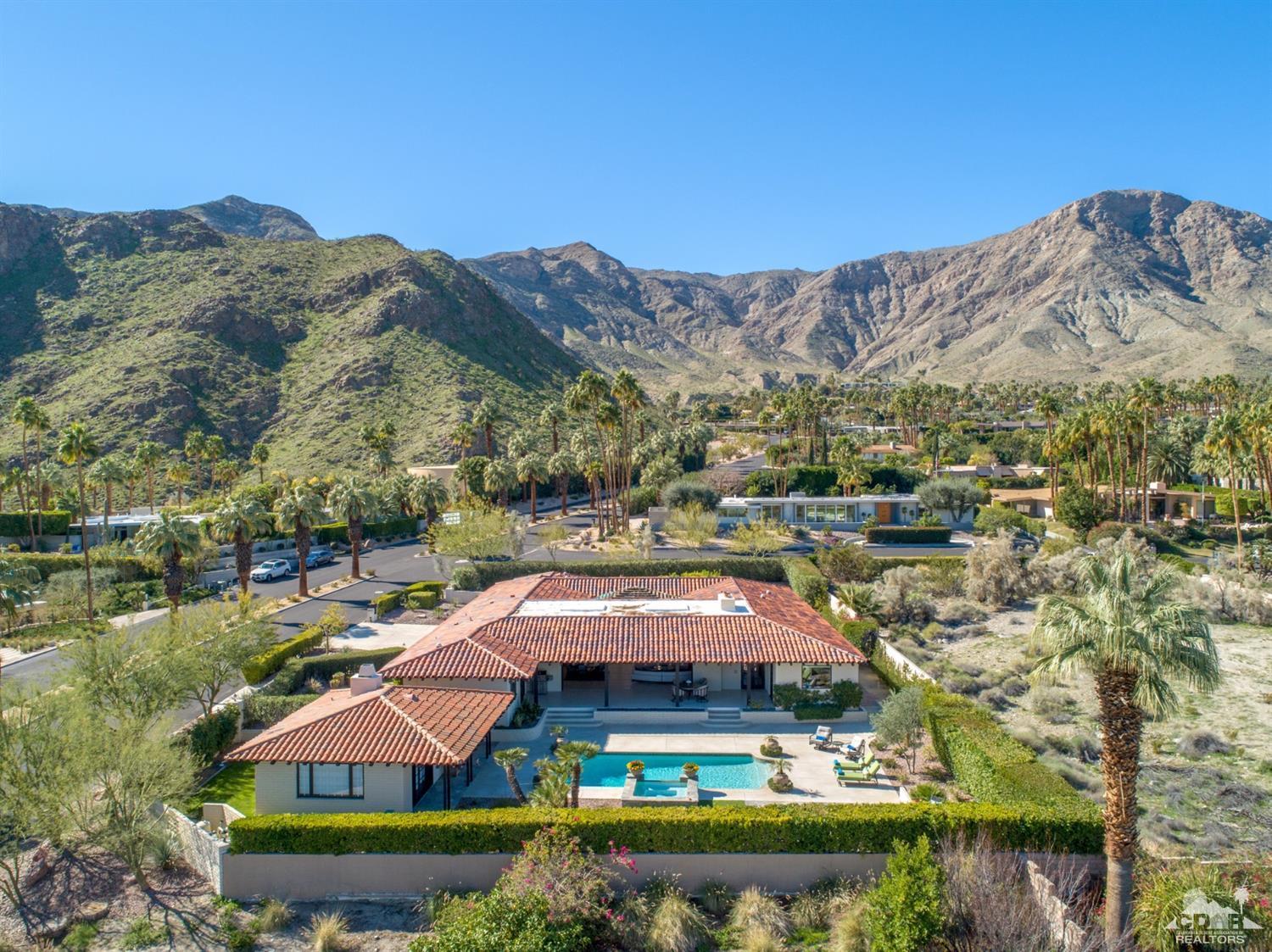 40757 Thunderbird Road Rancho Mirage, CA 92270 - Photo 63 of 70 an aerial view of residential houses with outdoor space and swimming pool