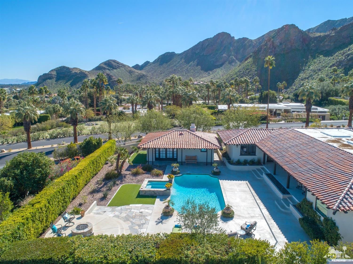 40757 Thunderbird Road Rancho Mirage, CA 92270 - Photo 67 of 70 a view of a house with a yard and balcony