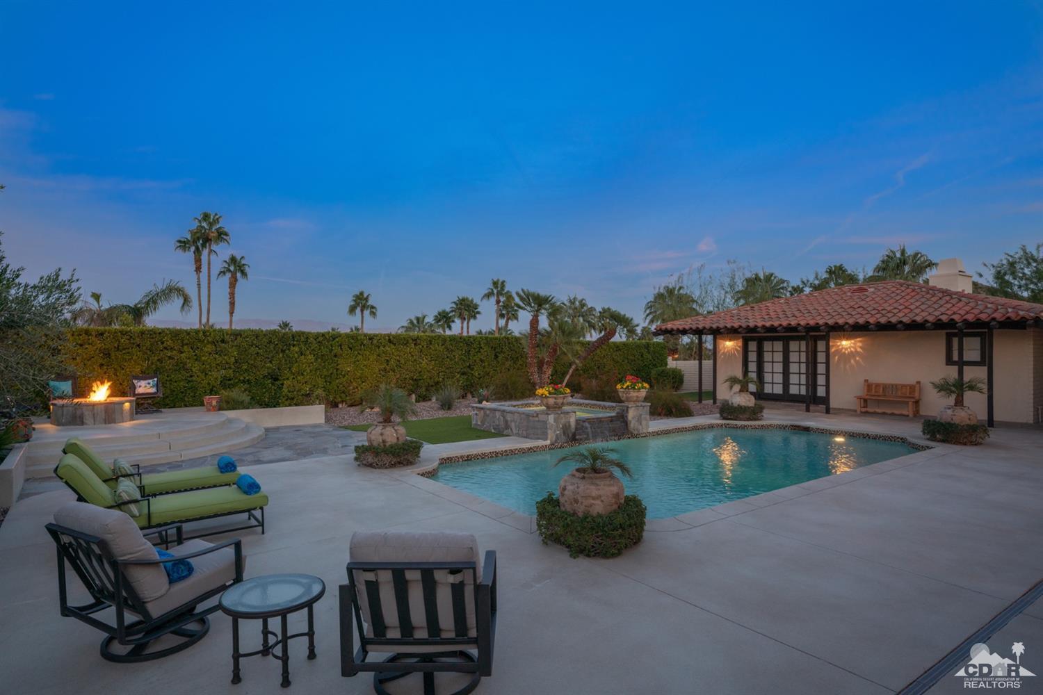 40757 Thunderbird Road Rancho Mirage, CA 92270 - Photo 8 of 70 a view of a house with pool and chairs