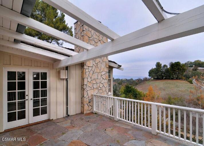 5537 Round Meadow Road Hidden Hills, CA 91302 - Photo 13 of 17 a view of a porch