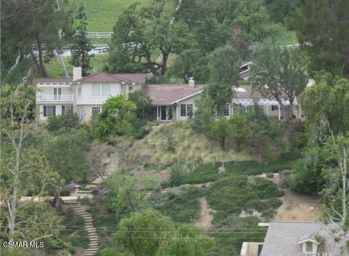 5537 Round Meadow Road Hidden Hills, CA 91302 - Photo 2 of 17 an aerial view of residential house with outdoor space