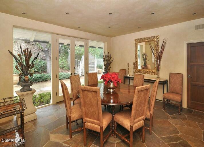 5537 Round Meadow Road Hidden Hills, CA 91302 - Photo 5 of 17 a dining room with furniture and window