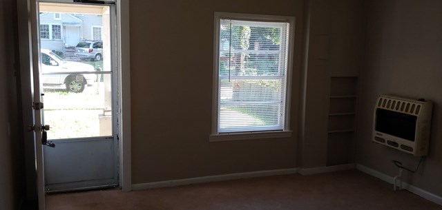 918 Dozier Street Columbus, GA 31904 - Photo 3 of 12 a view of an empty room with a window