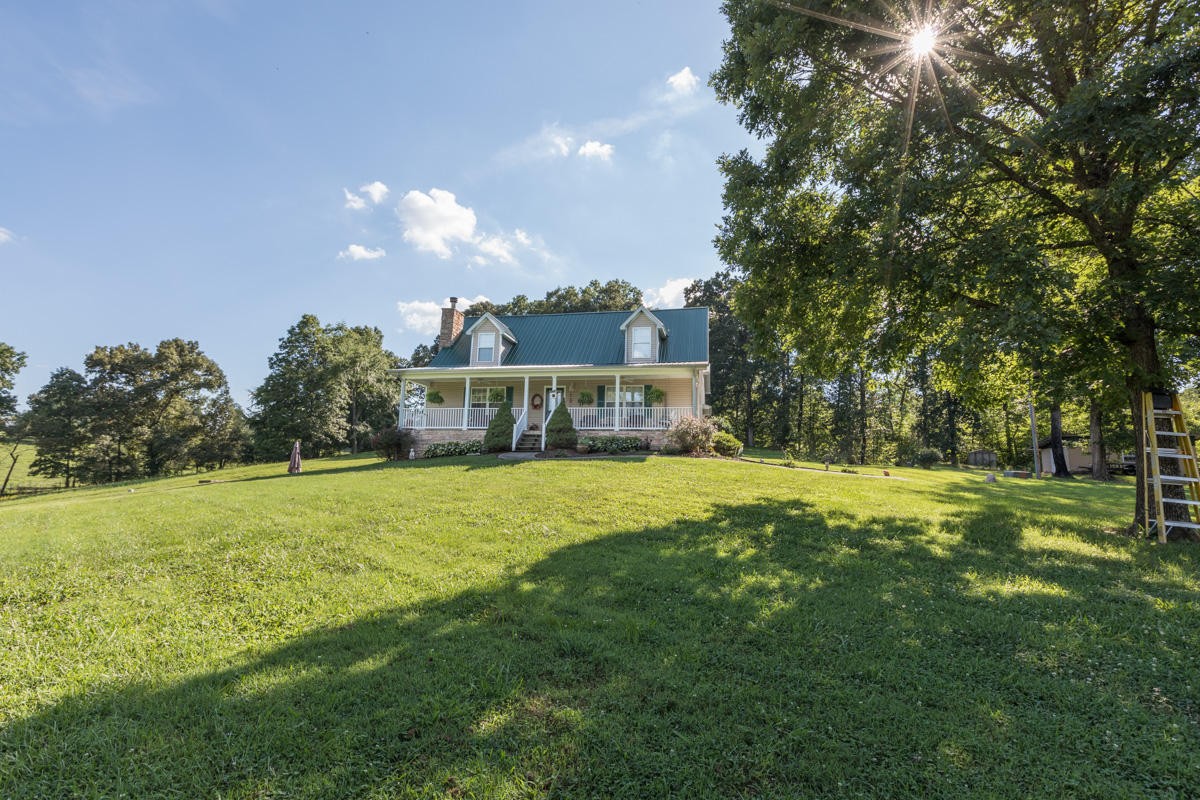 313 Gage Road Philadelphia, TN 37846 - Photo 2 of 21 a view of a house with a big yard