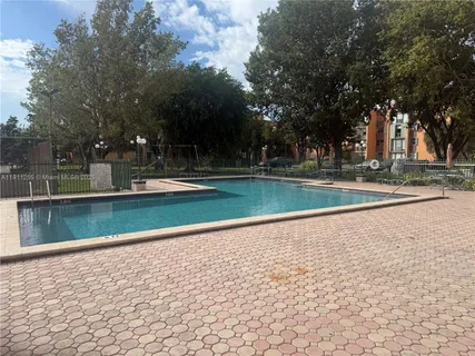 a view of backyard with green space