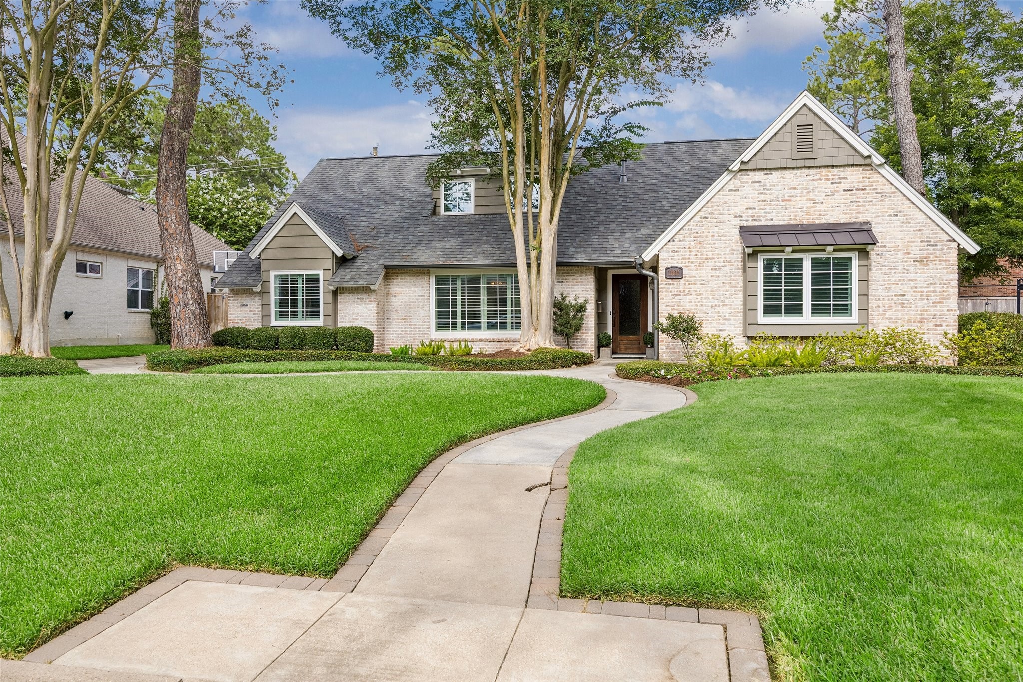 12615 Taylorcrest Road Houston, TX 77024 - Photo 2 of 29 This welcoming walkway leads to a cozy front entrance of this renovated 5 Bedroom/2½ Bath home.