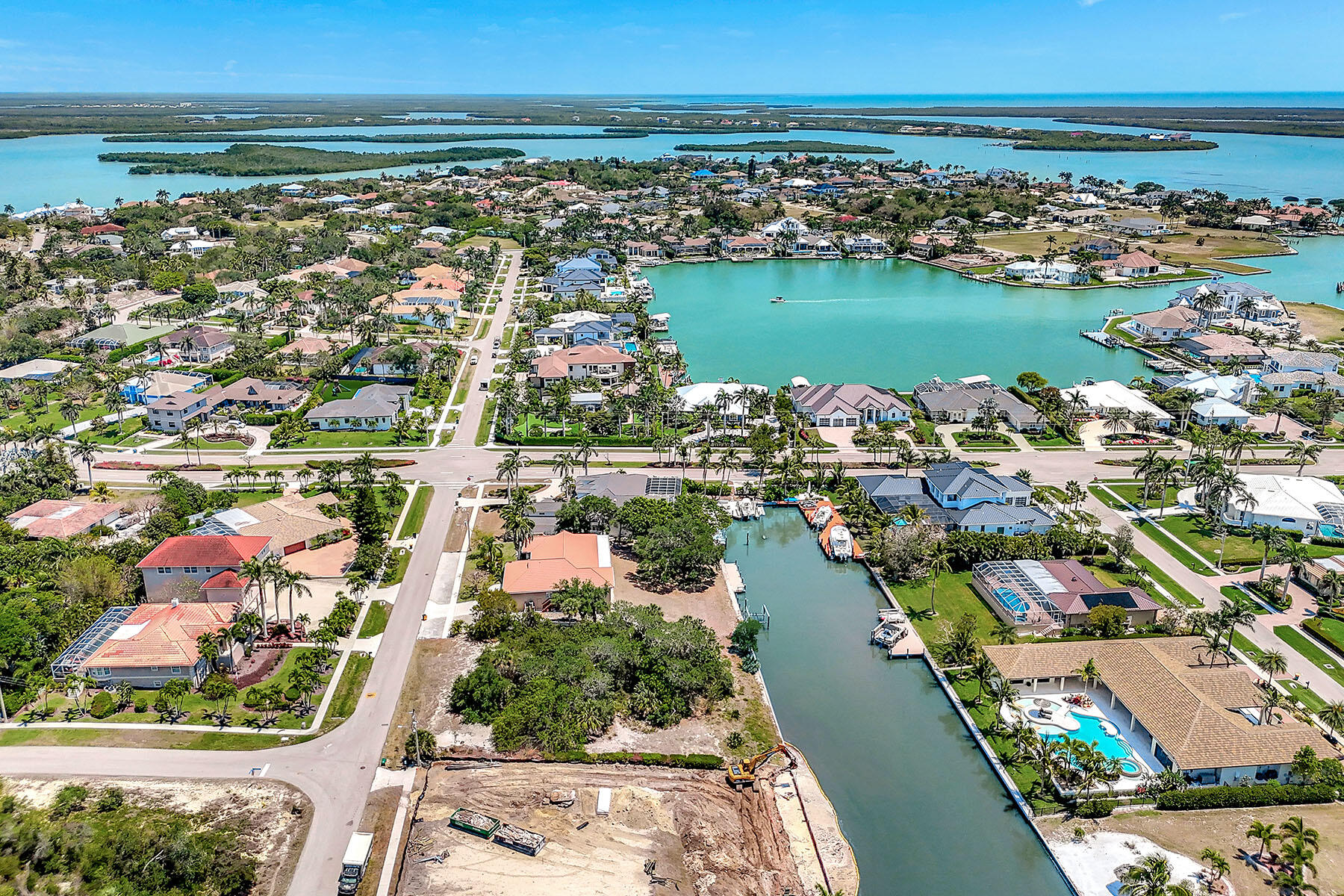 1665 Ludlow Road Marco Island, FL 34145 - Photo 8 of 11 an aerial view of city and lake