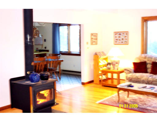 136 Middle Road Boxborough, MA 01719 - Photo 6 of 12 a living room with furniture and a lamp
