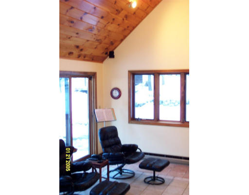 136 Middle Road Boxborough, MA 01719 - Photo 9 of 12 a living room with furniture and a window