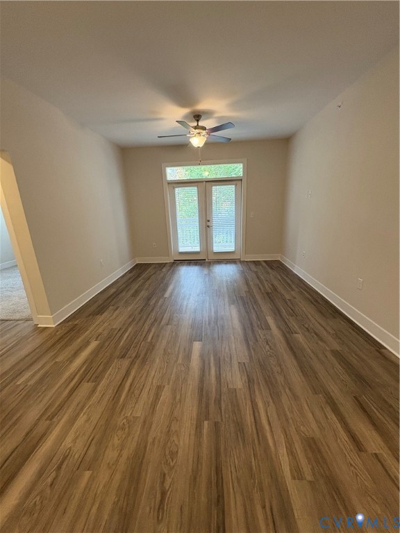 10525 Stony Blf Drive, Unit 205 Ashland, VA 23005 - Photo 4 of 9 wooden floor in an empty room with a window