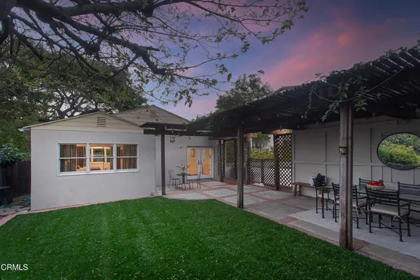 a house view with a garden space