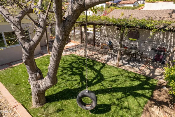 a backyard of a house with lots of green space