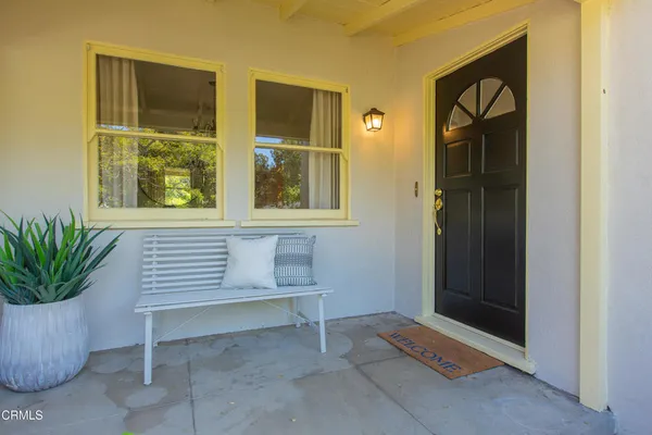 a view of outdoor space with deck and window