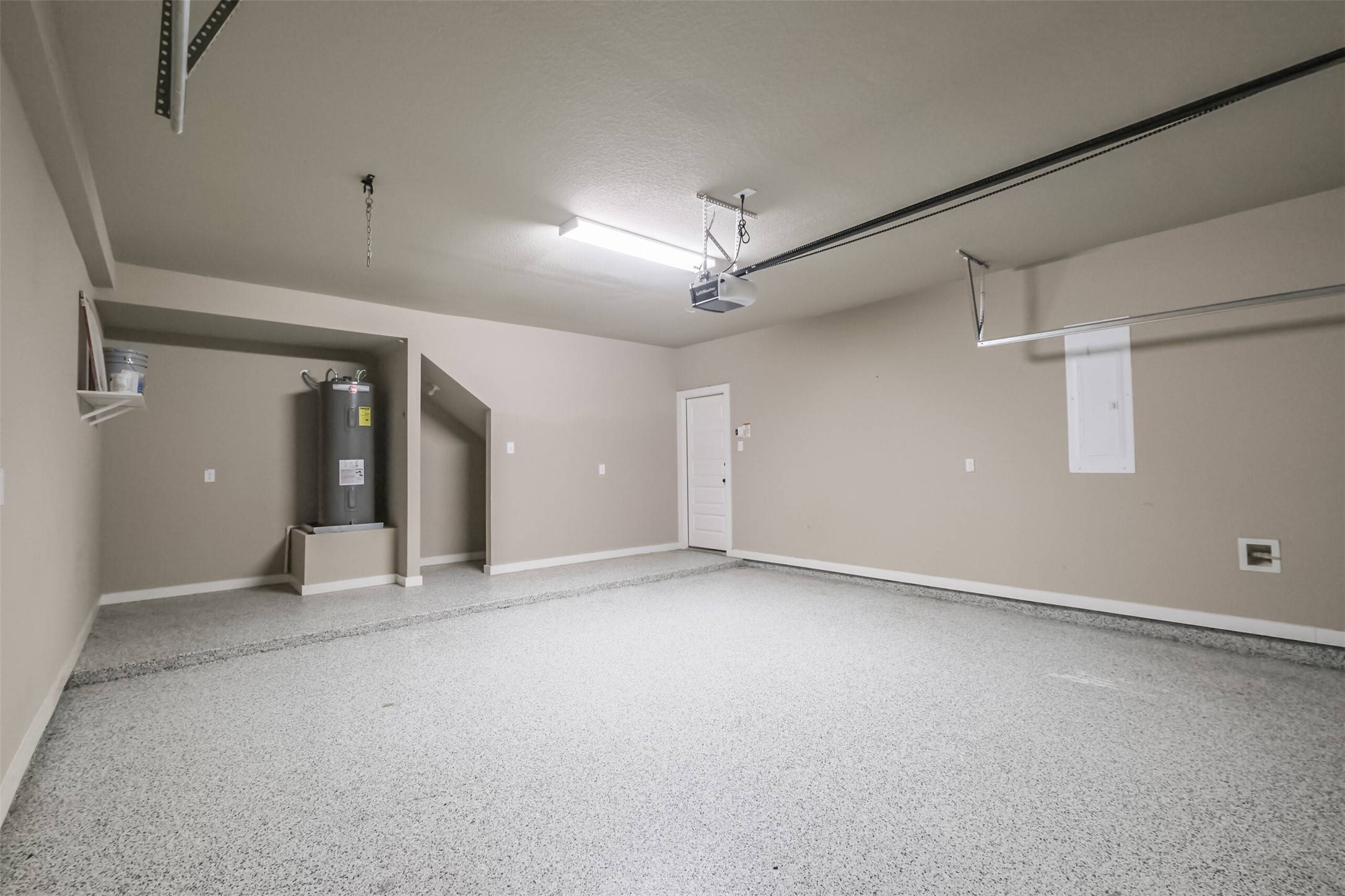 121 Wickersham, Unit A Conroe, TX 77304 - Photo 29 of 37 a view of an empty room with a window