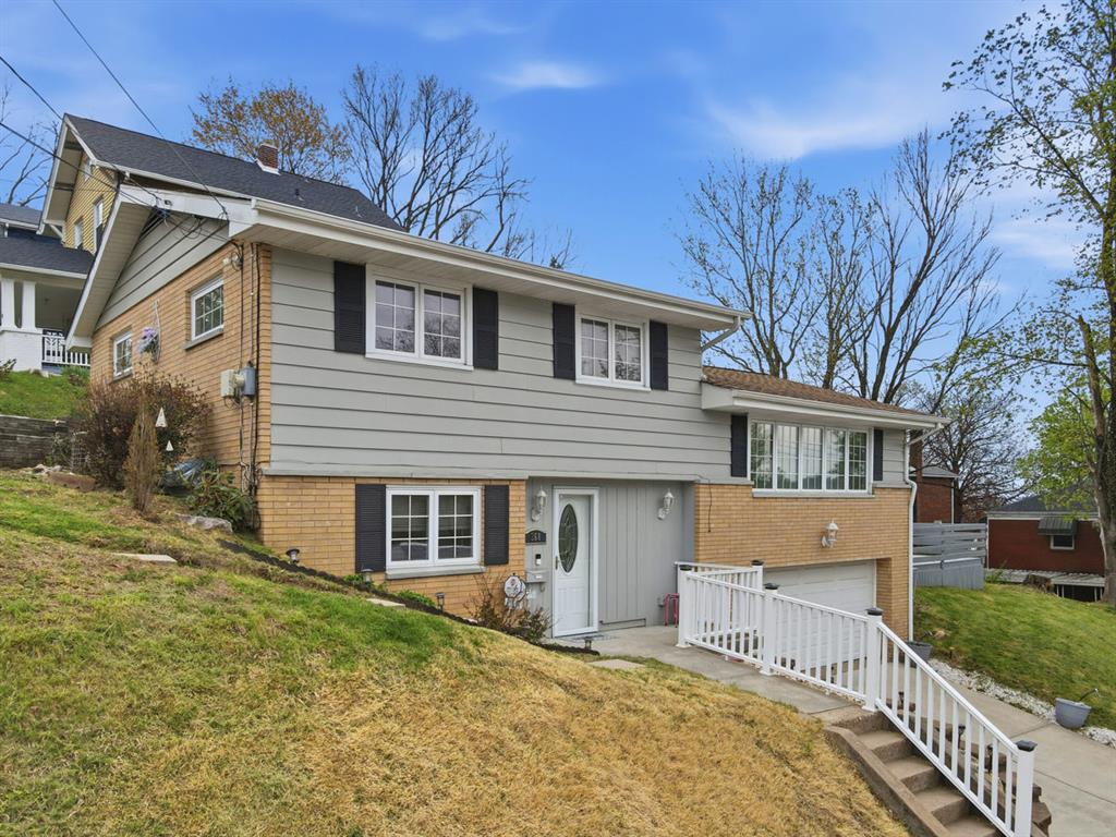 268 Plummer Avenue Pittsburgh, PA 15202 - Photo 2 of 50 front view of a house with a yard