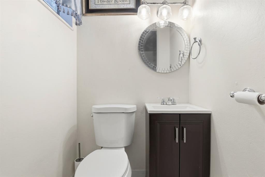 268 Plummer Avenue Pittsburgh, PA 15202 - Photo 30 of 50 a bathroom with a toilet a sink and mirror
