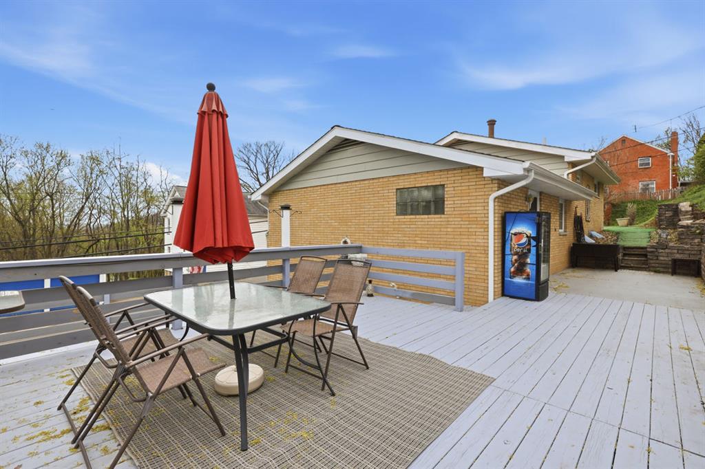 268 Plummer Avenue Pittsburgh, PA 15202 - Photo 40 of 50 a view of a chairs and table on the deck with wooden floor and barbeque oven