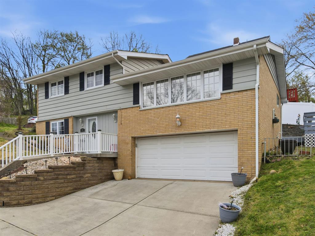 268 Plummer Avenue Pittsburgh, PA 15202 - Photo 4 of 50 a front view of a house with a yard