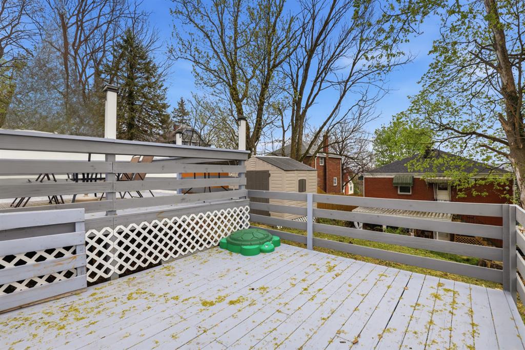 268 Plummer Avenue Pittsburgh, PA 15202 - Photo 41 of 50 a front view of a house with a bench