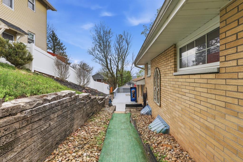 268 Plummer Avenue Pittsburgh, PA 15202 - Photo 44 of 50 a view of a pathway with a house in the background