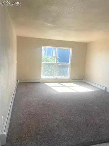 a bathroom with a toilet a sink and bathtub