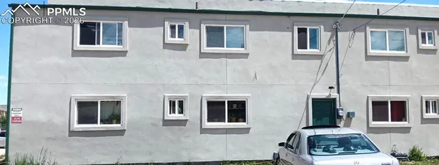 a car parked in front of a house