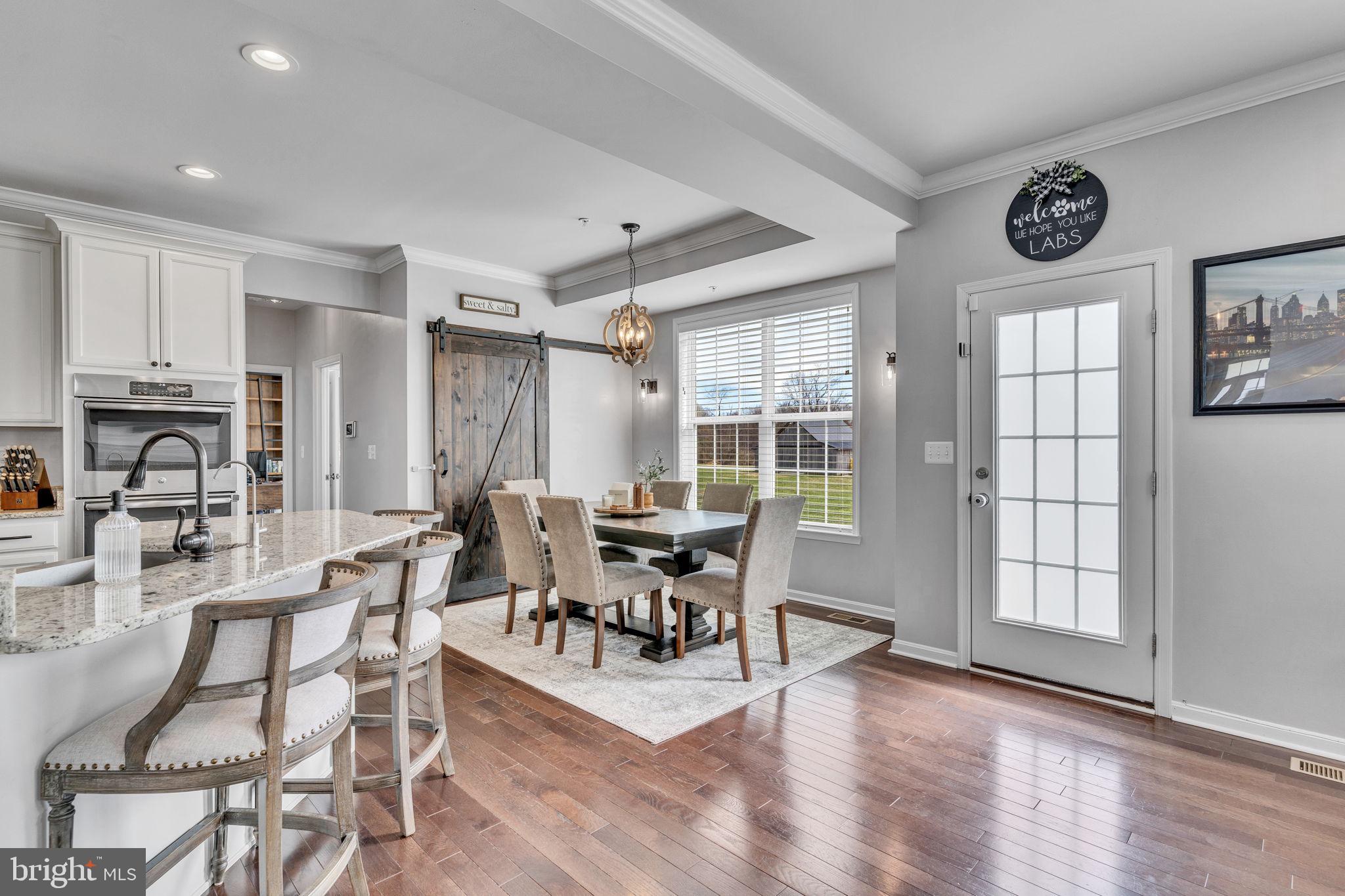 1935 Lowery Road Huntingtown, MD 20639 - Photo 12 of 65 a view of a dining room with furniture window and outside view