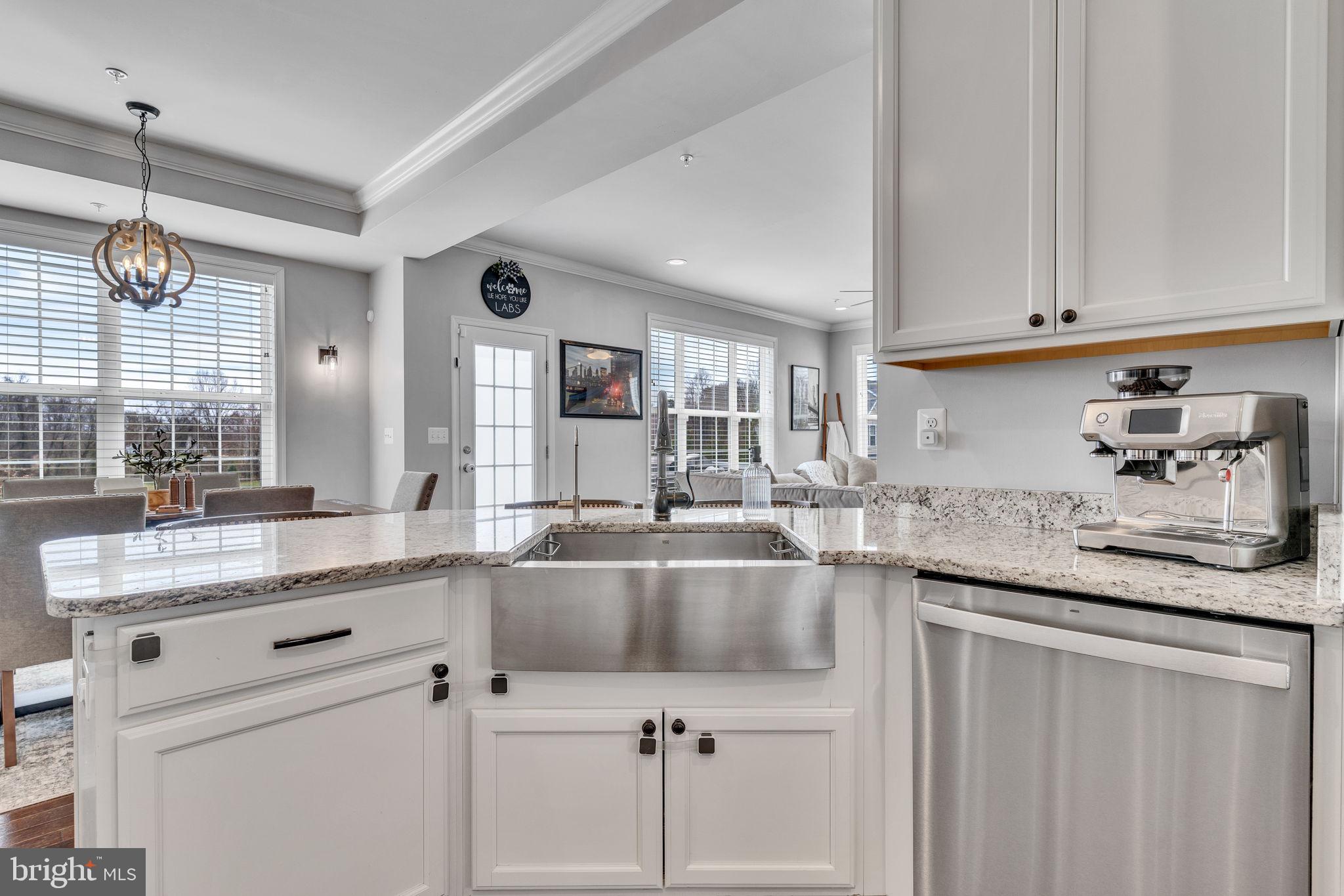 1935 Lowery Road Huntingtown, MD 20639 - Photo 15 of 65 a kitchen with granite countertop a sink and cabinets