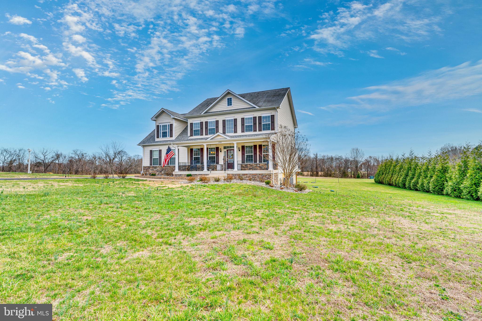 1935 Lowery Road Huntingtown, MD 20639 - Photo 2 of 65 a front view of a house with a yard