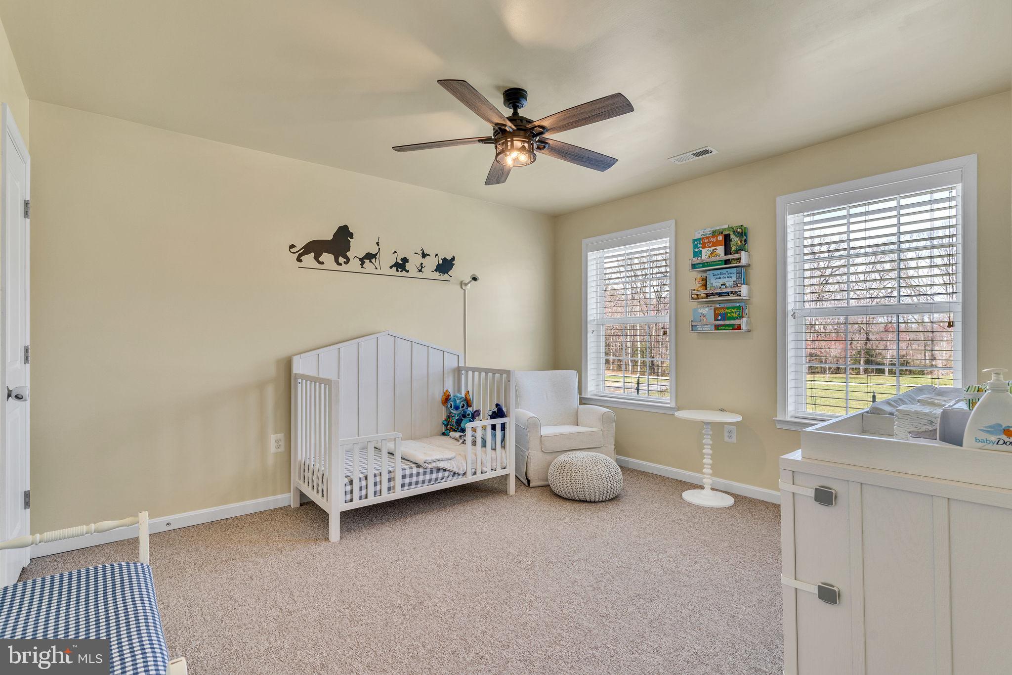 1935 Lowery Road Huntingtown, MD 20639 - Photo 36 of 65 a bed room with a bed and a window