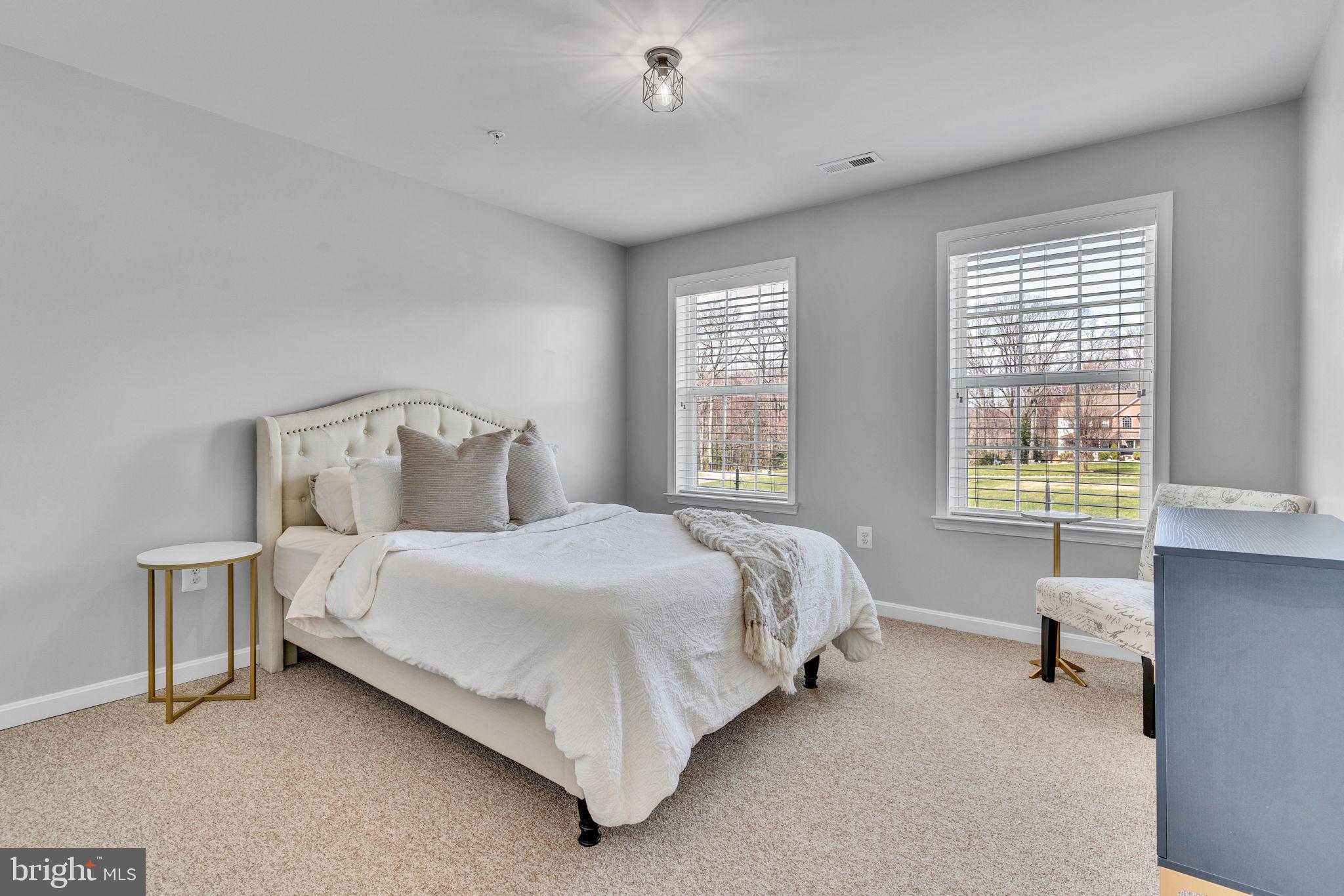 1935 Lowery Road Huntingtown, MD 20639 - Photo 38 of 65 a bedroom with a bed chair and a window