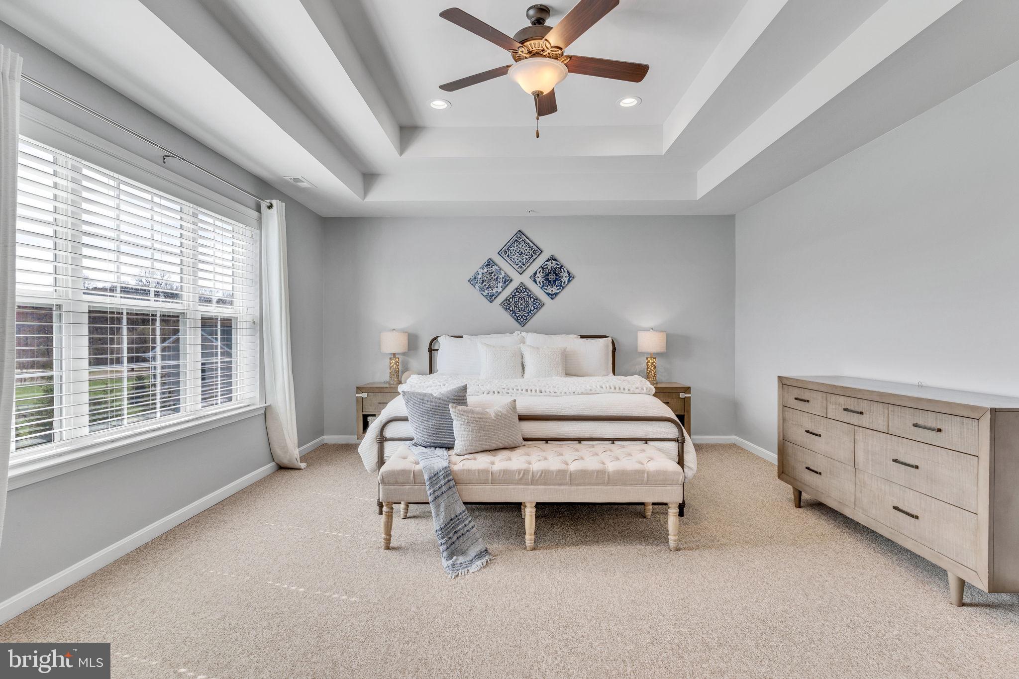 1935 Lowery Road Huntingtown, MD 20639 - Photo 45 of 65 a spacious bedroom with a bed and a window
