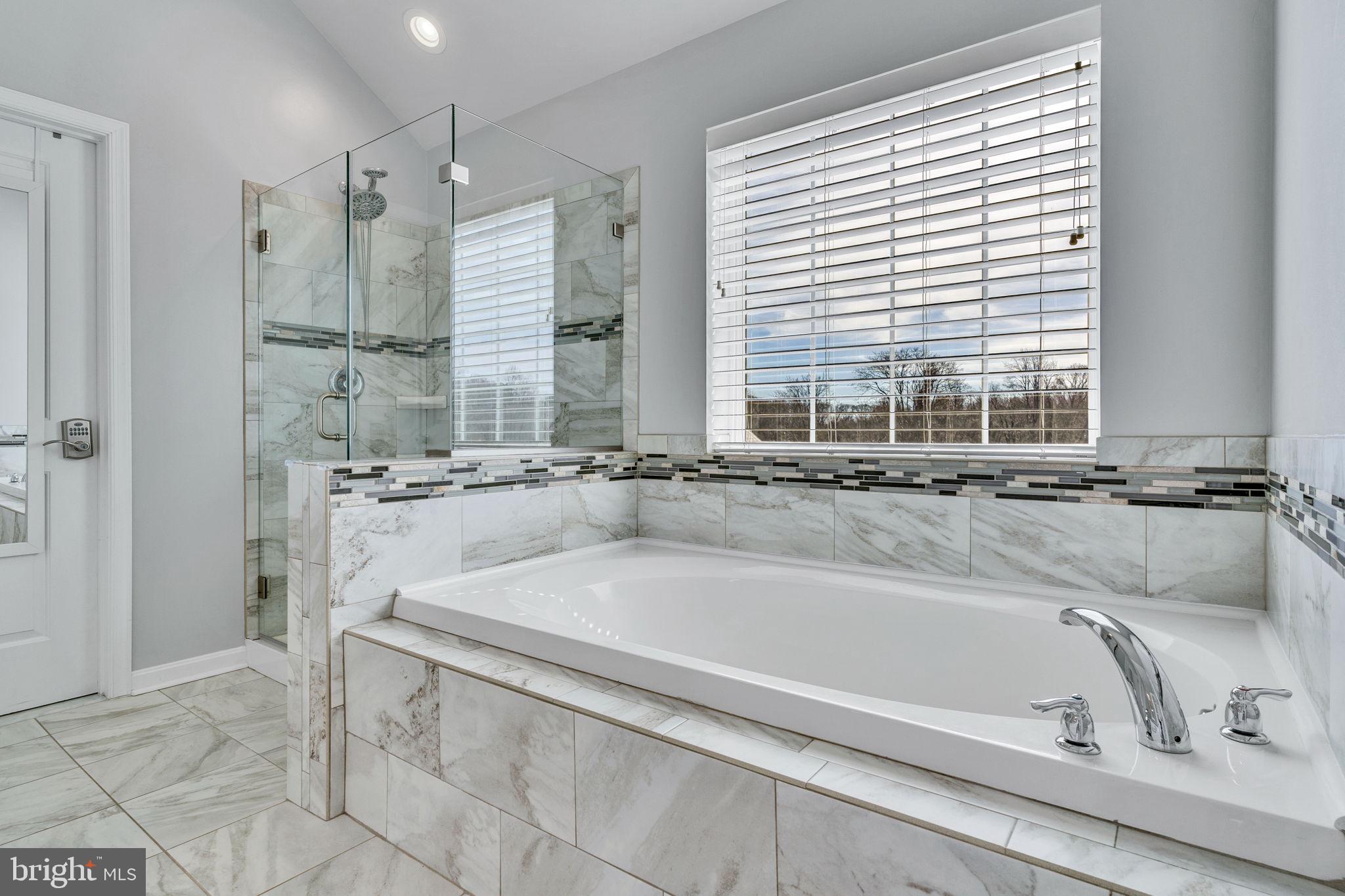 1935 Lowery Road Huntingtown, MD 20639 - Photo 50 of 65 a bathroom with a bathtub and a sink