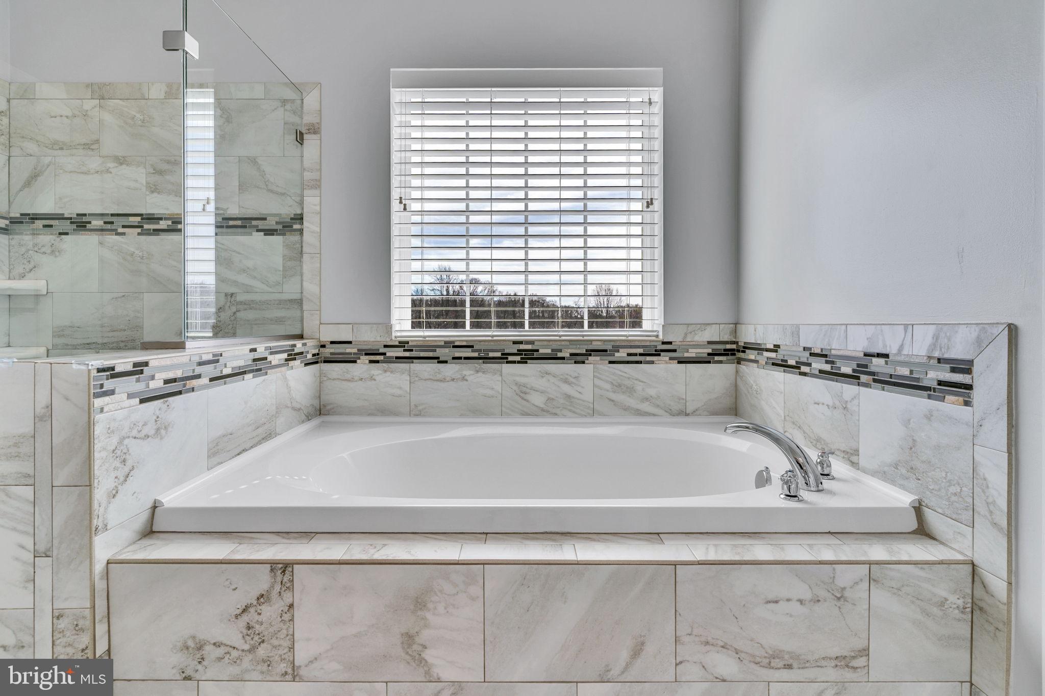1935 Lowery Road Huntingtown, MD 20639 - Photo 51 of 65 a close view of a bathtub in a bathroom