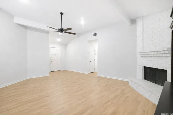 a view of empty room with fan