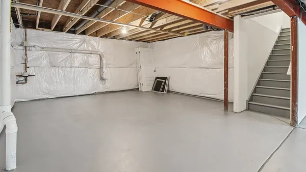 a view of a room with racks on the wall