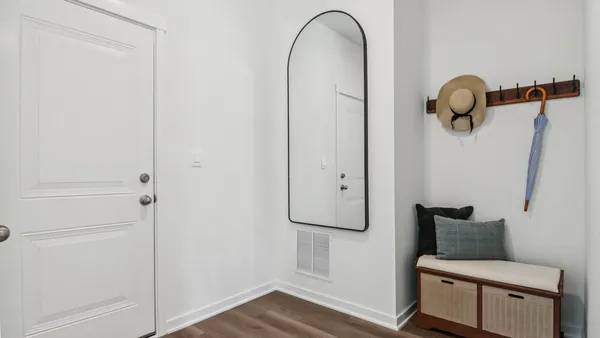 a picture of door with wooden floor