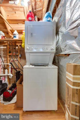 21053 Cornerpost Square Ashburn, VA 20147 - Photo 26 of 30 a utility room with dryer and washer