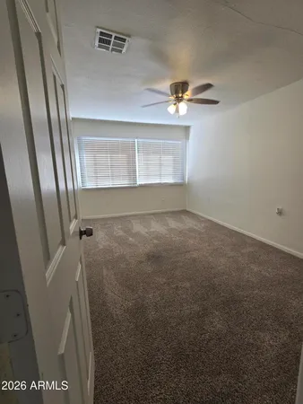 a bathroom with a sink a mirror and a shower