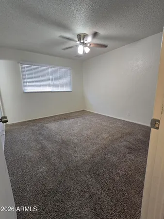 a view of room with racks on the wall