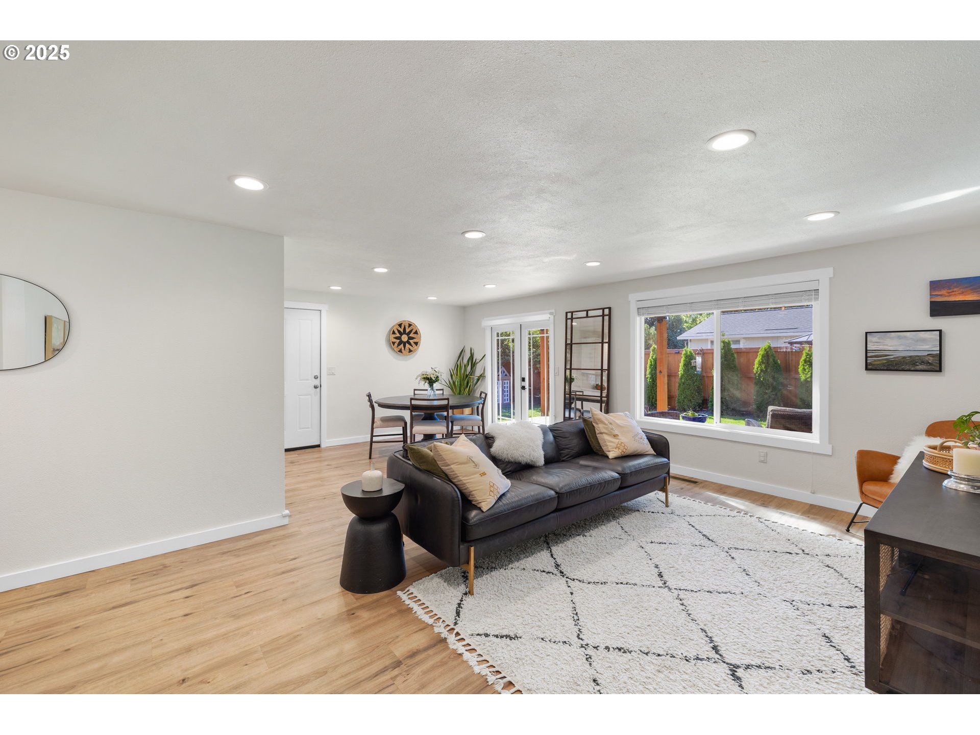 1905 Springbrook Way Newberg, OR 97132 - Photo 2 of 29 a living room with furniture and a large window