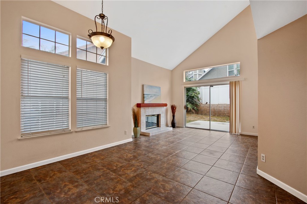 3117 Antler Road Ontario, CA 91761 - Photo 4 of 16 a view of livingroom with furniture wooden floor and window