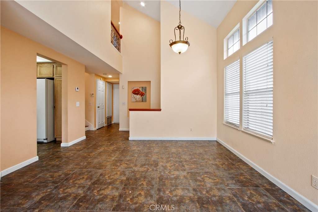 3117 Antler Road Ontario, CA 91761 - Photo 5 of 16 an empty room with windows and closet