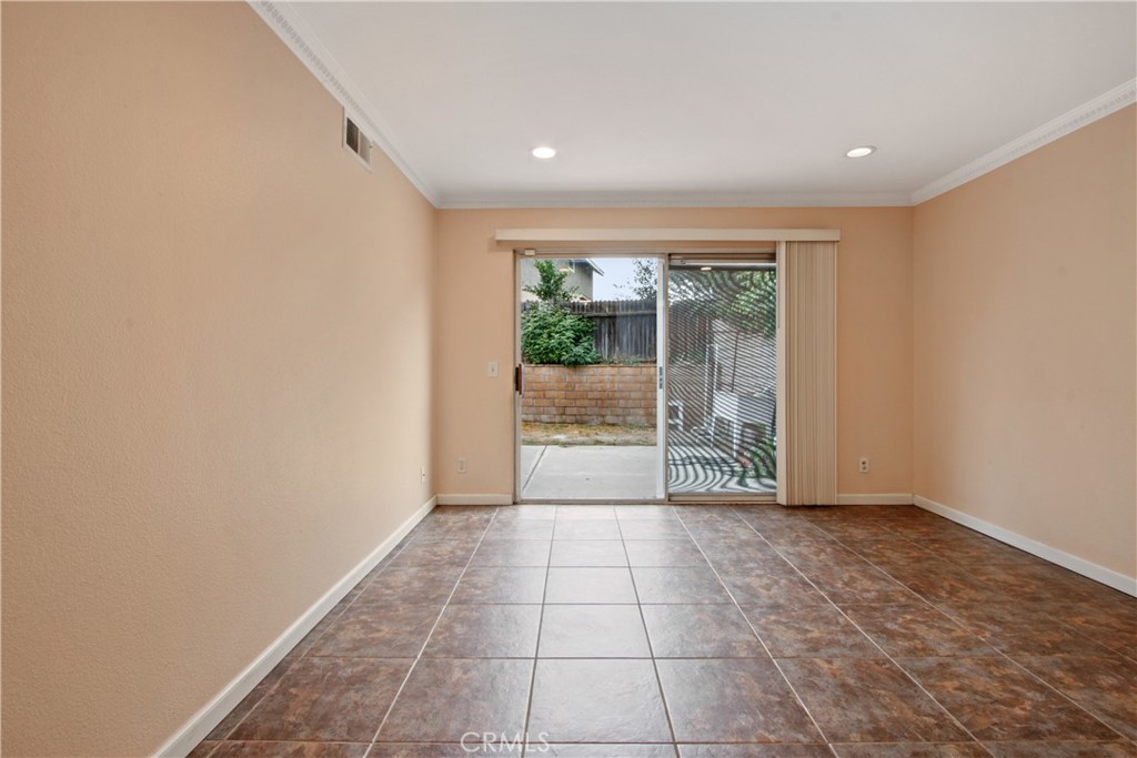 3117 Antler Road Ontario, CA 91761 - Photo 6 of 16 a view of an empty room with a window
