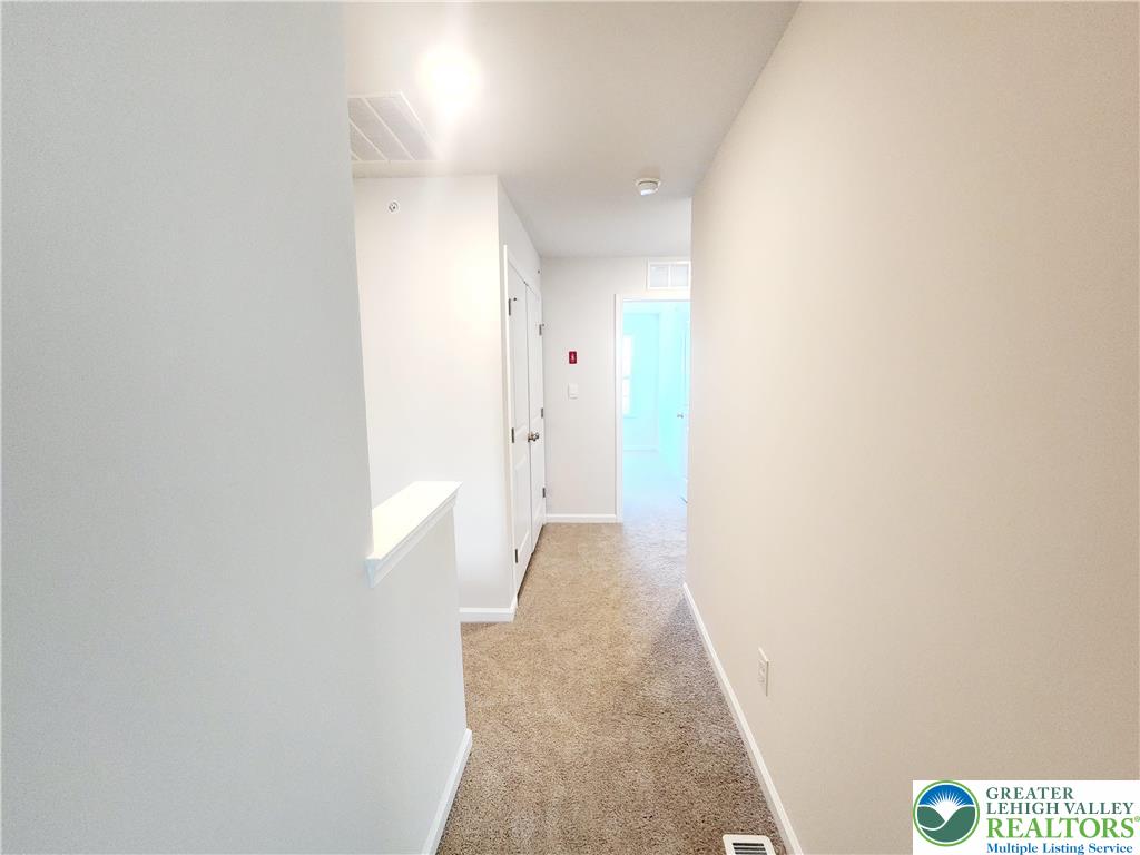 1104 Martin Road Breinigsville, PA 18031 - Photo 18 of 30 a view of a hallway with a white walls