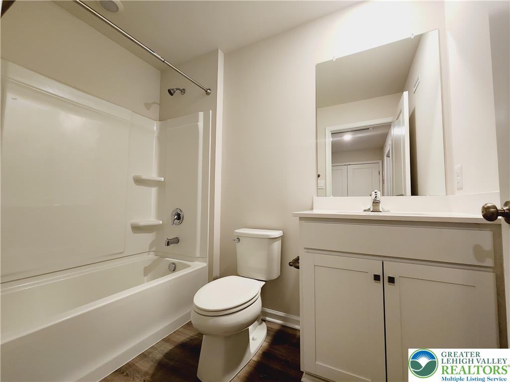 1104 Martin Road Breinigsville, PA 18031 - Photo 19 of 30 a bathroom with a sink a toilet and shower