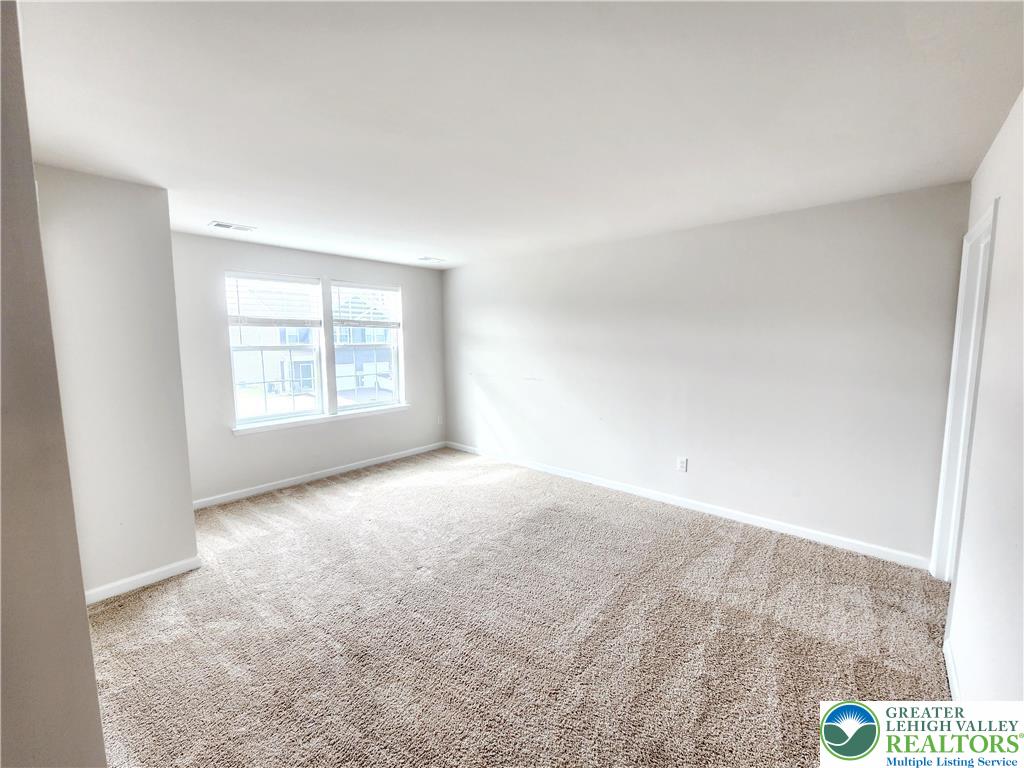 1104 Martin Road Breinigsville, PA 18031 - Photo 21 of 30 an empty room with windows