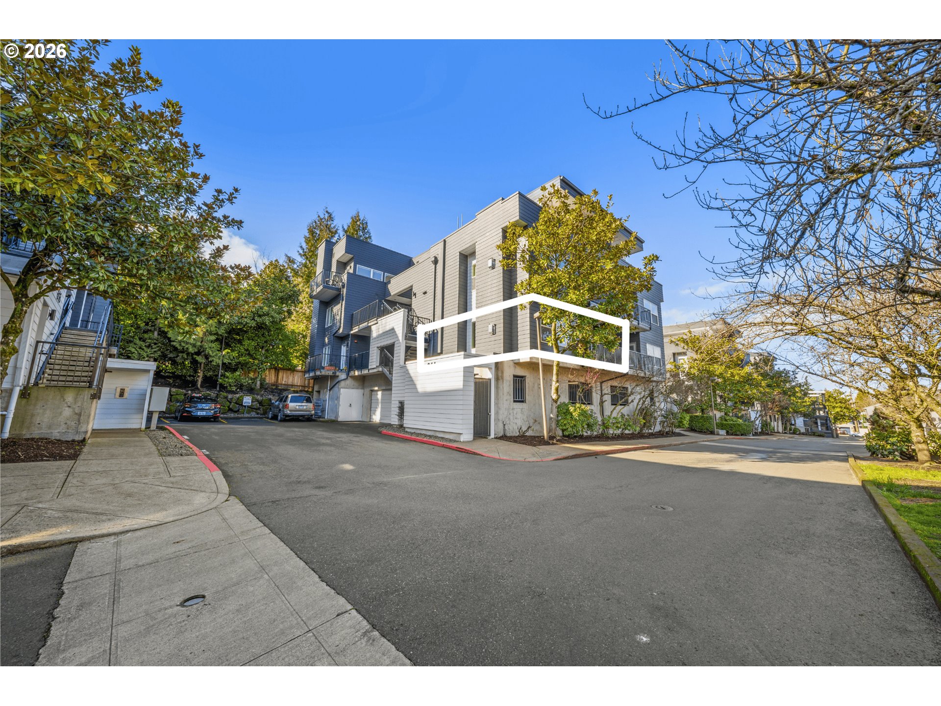 614 South Nevada Street, Unit B Portland, OR 97219 - Photo 1 of 29 a view of a street with a building in the background