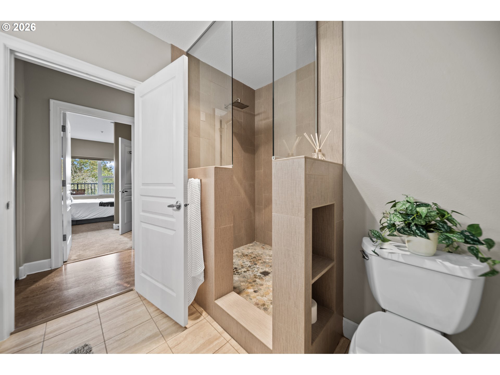 614 South Nevada Street, Unit B Portland, OR 97219 - Photo 22 of 29 a bathroom with a toilet and a shower